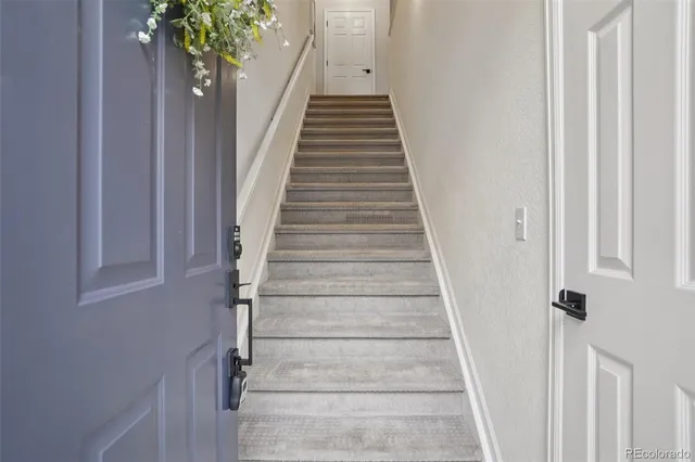 a view of entryway with wooden floor