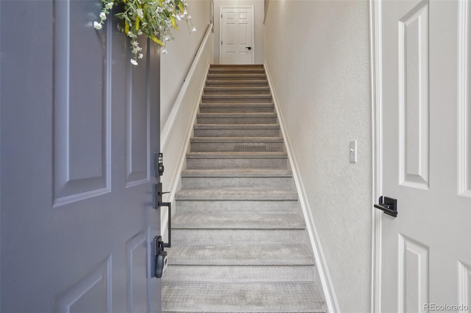 4271 South Blackhawk Circle, Unit 2C Aurora, CO 80014 - Photo 43 of 45 a view of entryway with wooden floor