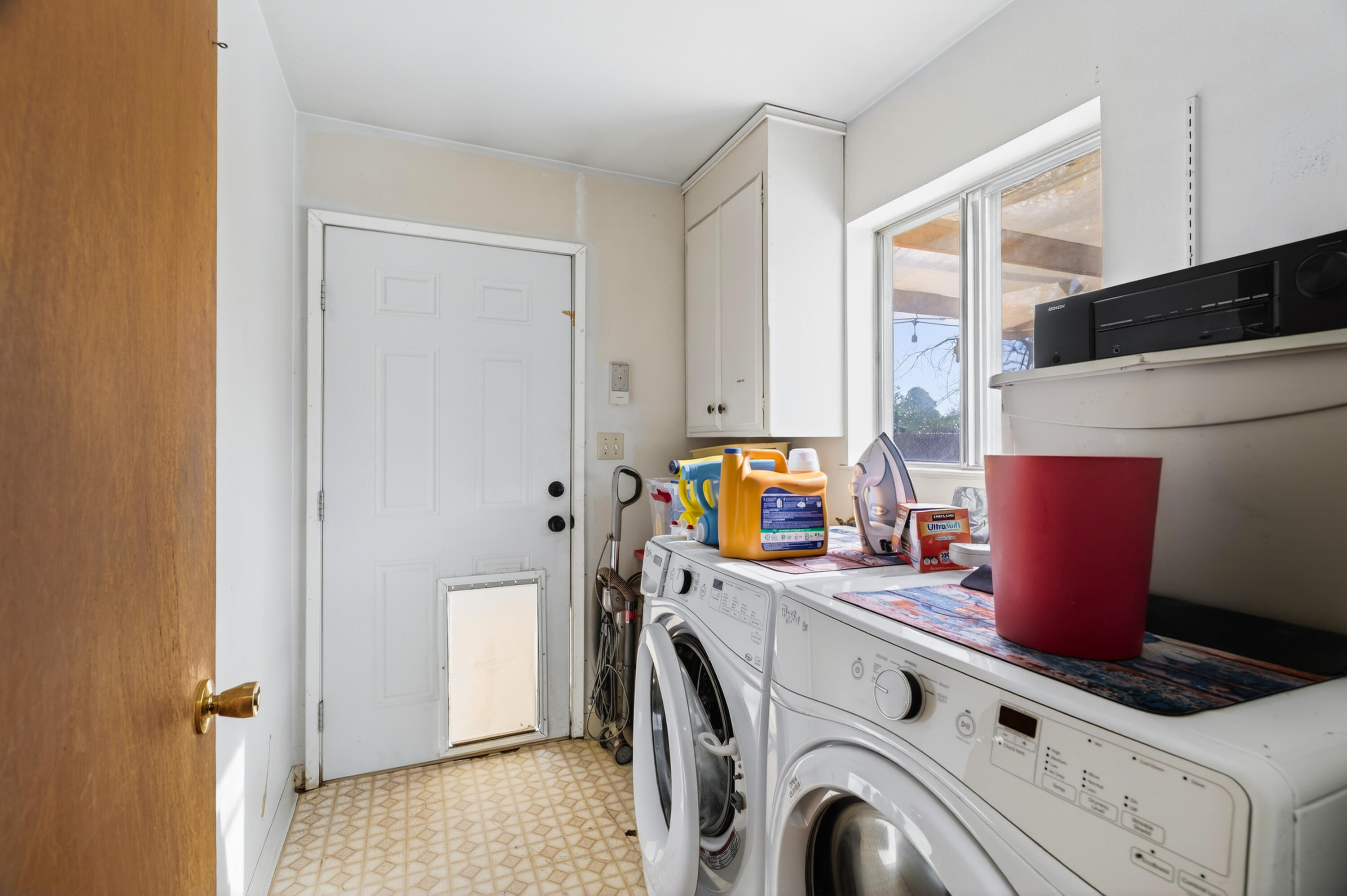 1877 Wheeler Street Redding, CA 96002 - Photo 21 of 38 Laundry off of Primary Bedroom