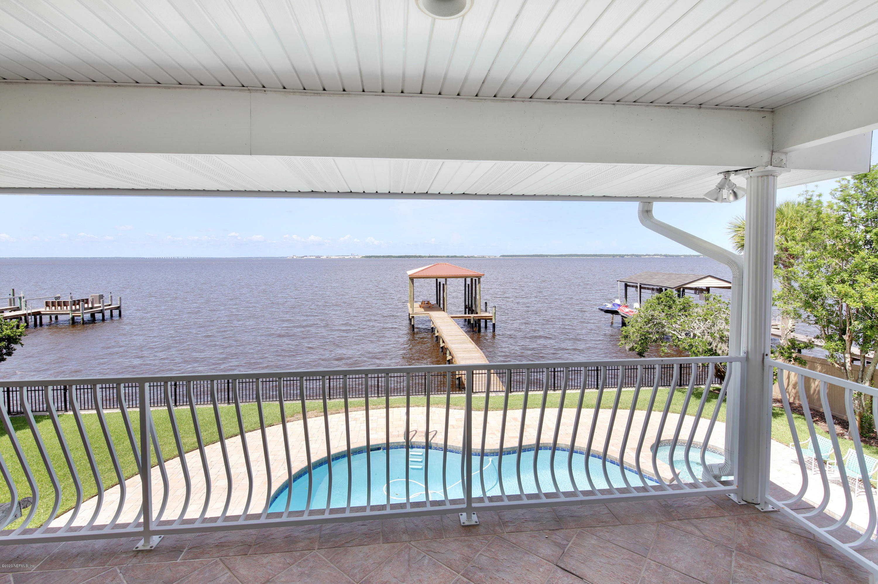 6526 Christopher Point Road West Jacksonville, FL 32217 - Photo 27 of 42 Balcony off Guest Bedroom