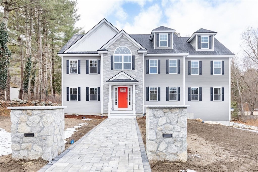 64 Francis Wyman Road Burlington, MA 01803 - Photo 1 of 42 a front view of a house with large windows