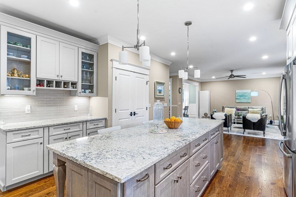 508 South Border Road Winchester, MA 01890 - Photo 15 of 41 a kitchen with center island table and chairs