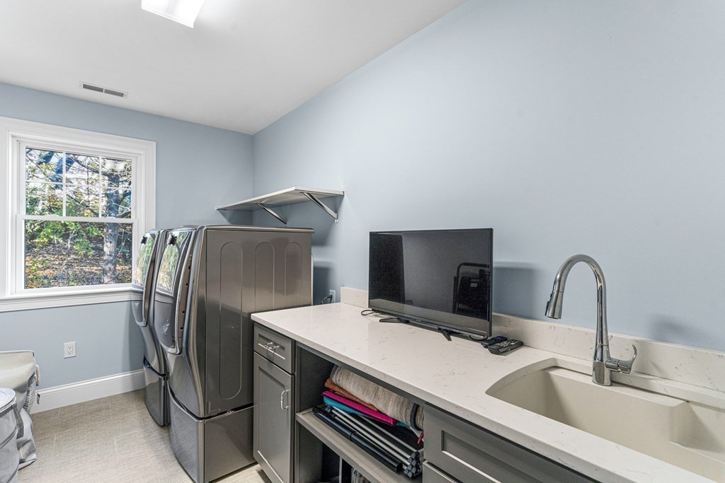 508 South Border Road Winchester, MA 01890 - Photo 23 of 41 a bathroom with a sink toilet and a mirror