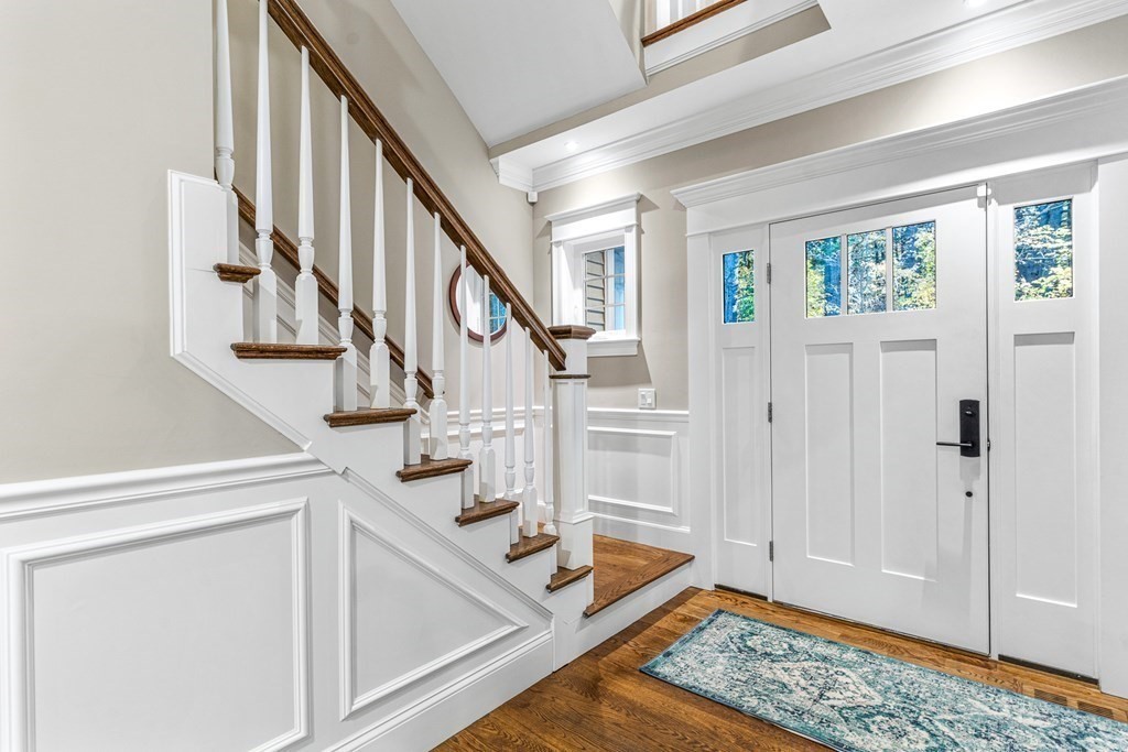 508 South Border Road Winchester, MA 01890 - Photo 3 of 41 a view of an entryway with wooden floor and staircase