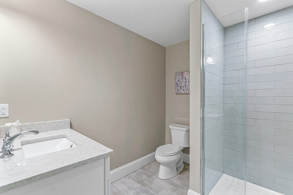508 South Border Road Winchester, MA 01890 - Photo 33 of 41 a bathroom with a sink a toilet and shower