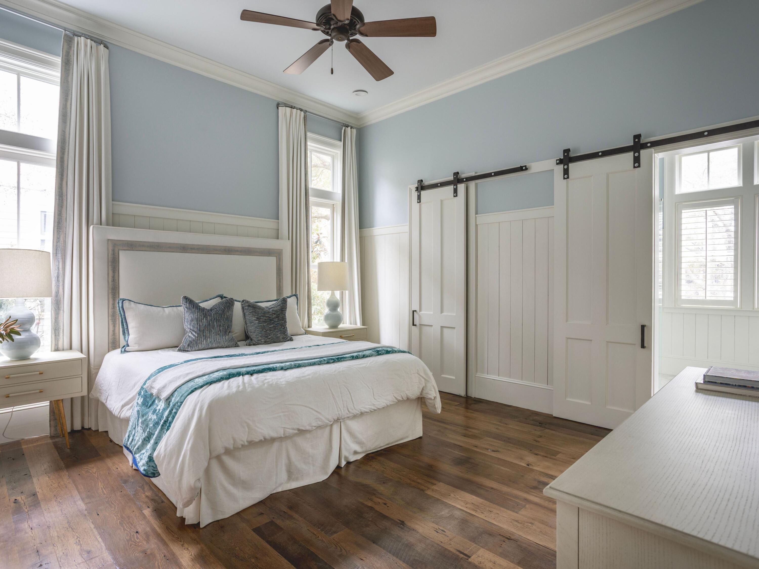 116 Wiregrass Way Santa Rosa Beach, FL 32459 - Photo 18 of 52 a bedroom with a bed window and a ceiling fan