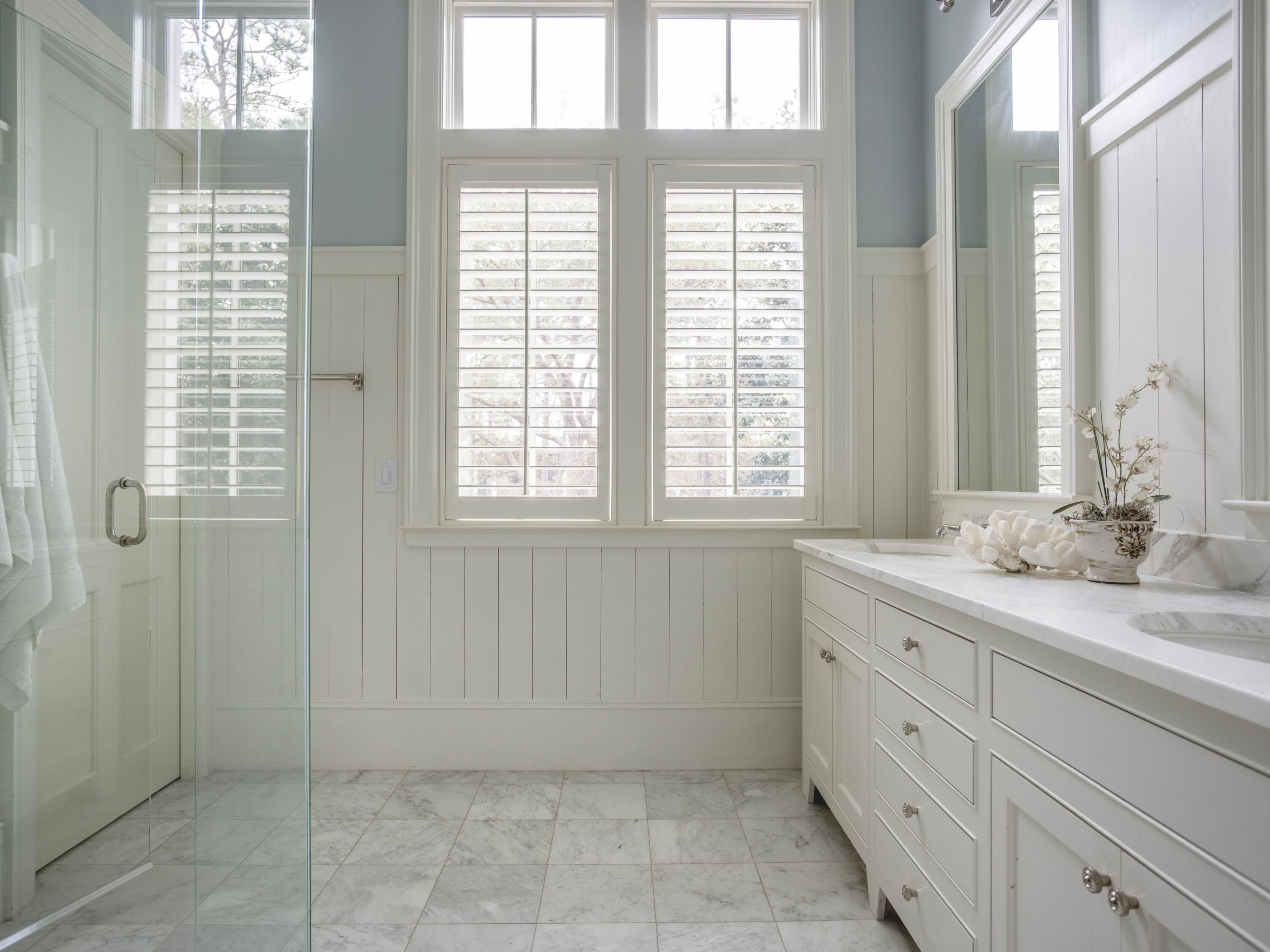116 Wiregrass Way Santa Rosa Beach, FL 32459 - Photo 19 of 52 a bathroom with a sink and a mirror
