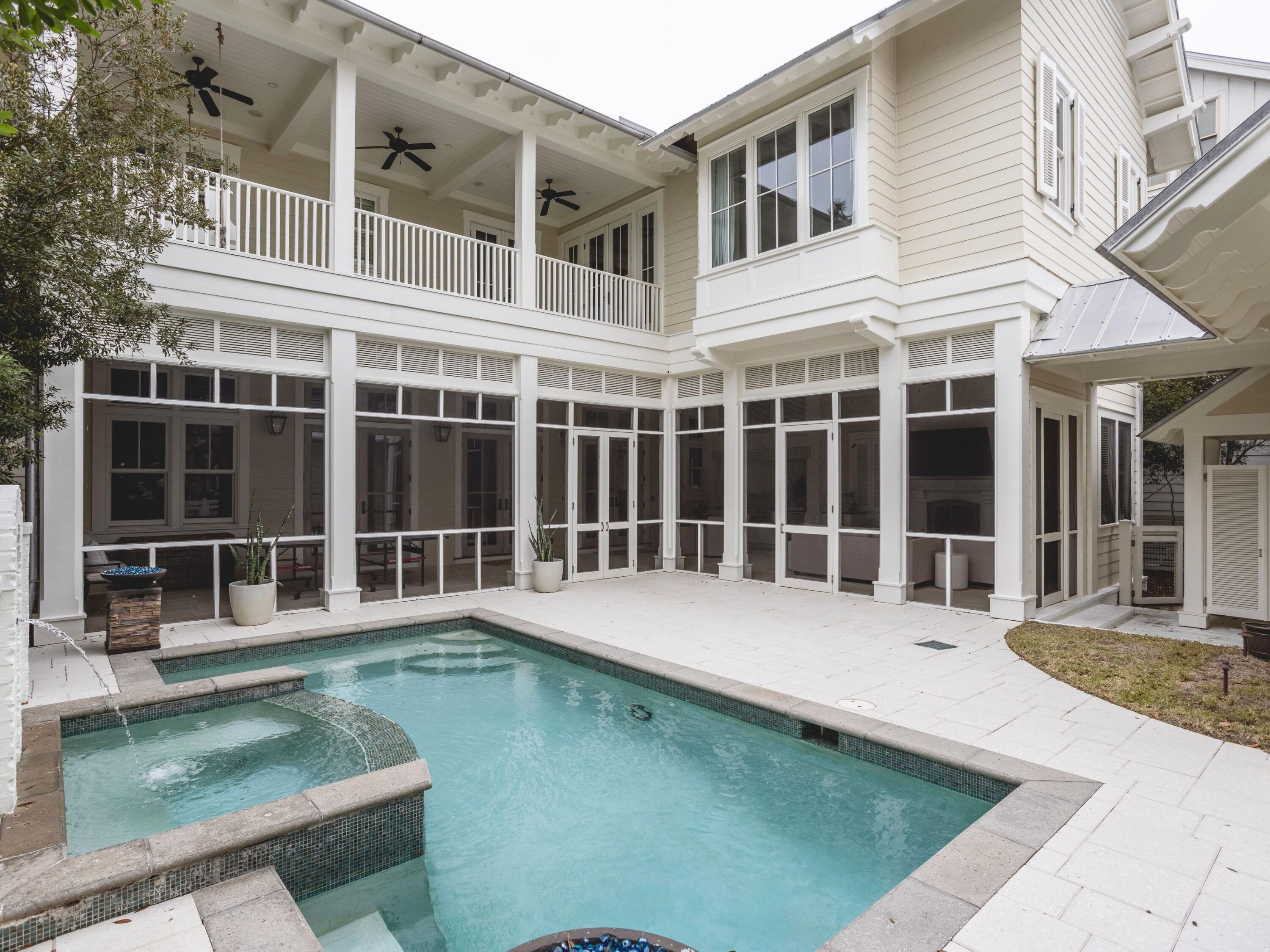 116 Wiregrass Way Santa Rosa Beach, FL 32459 - Photo 2 of 52 a view of a house with a swimming pool