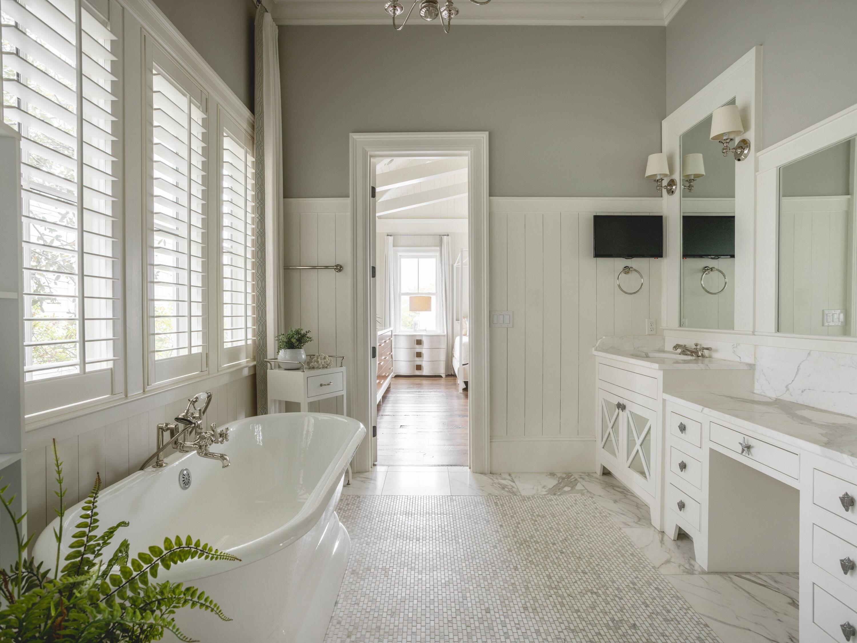 116 Wiregrass Way Santa Rosa Beach, FL 32459 - Photo 25 of 52 a spacious bathroom with a tub sink and mirror