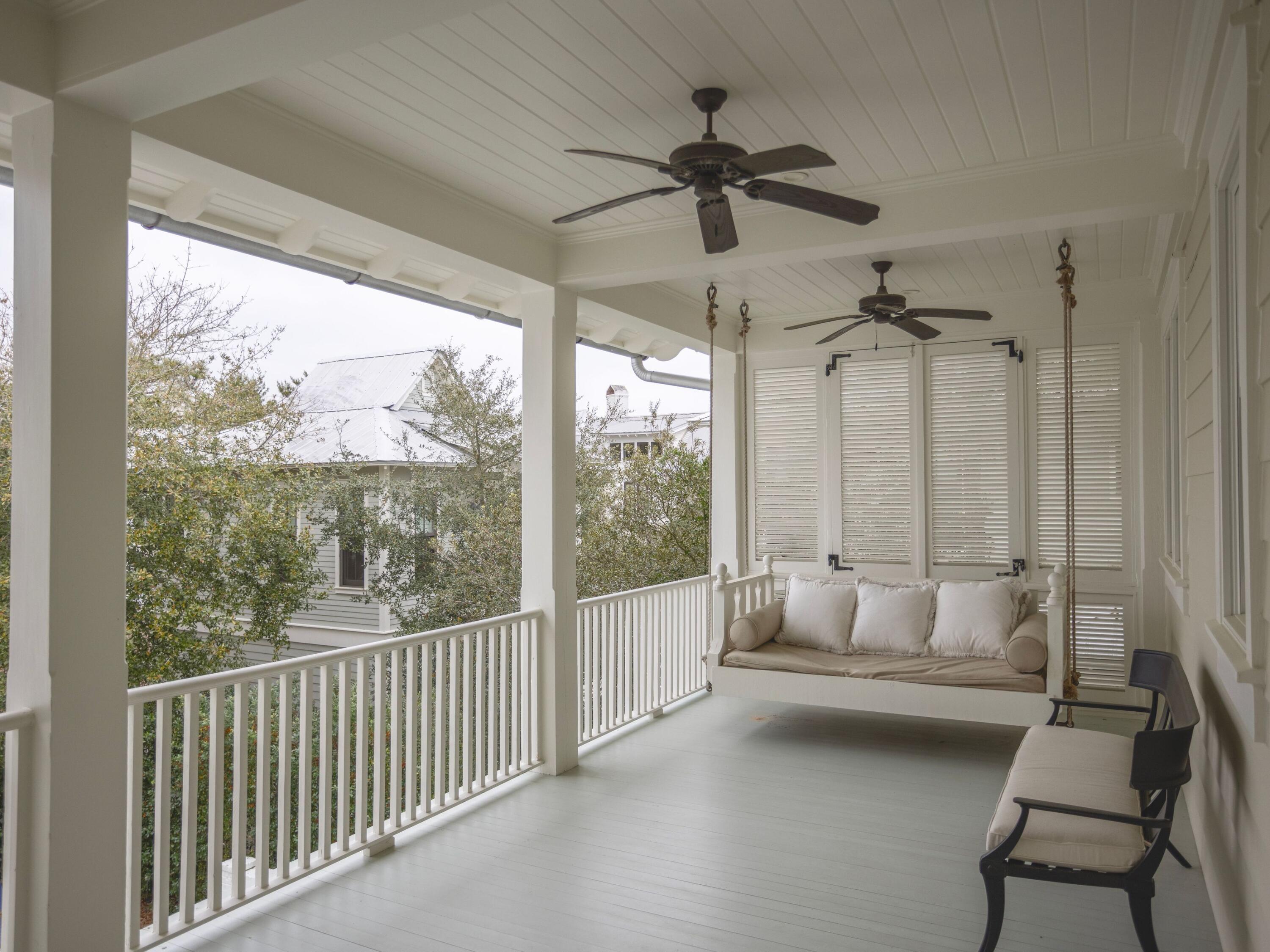 116 Wiregrass Way Santa Rosa Beach, FL 32459 - Photo 27 of 52 a living room with furniture and a large window