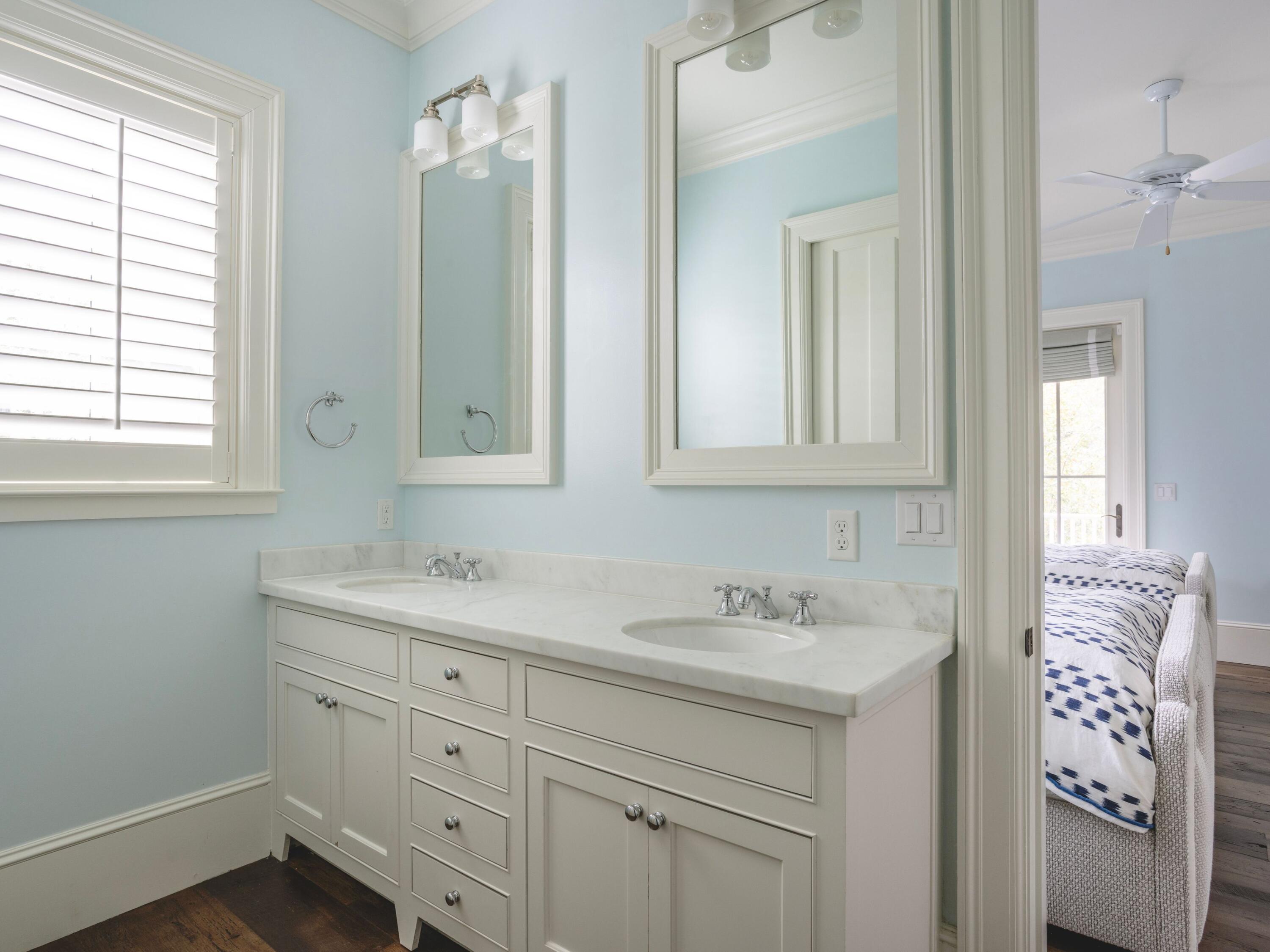 116 Wiregrass Way Santa Rosa Beach, FL 32459 - Photo 34 of 52 a bathroom with a sink and a mirror
