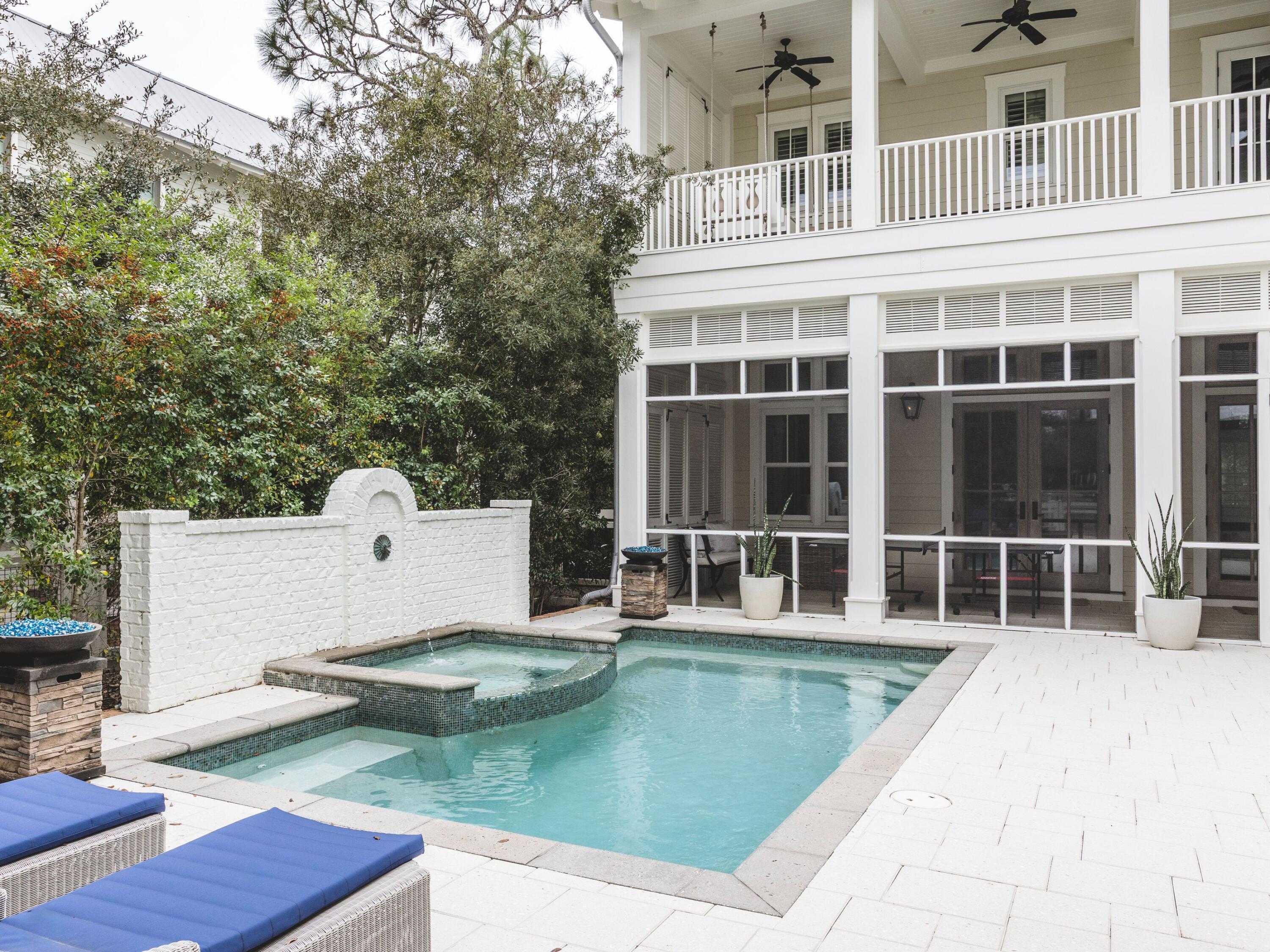 116 Wiregrass Way Santa Rosa Beach, FL 32459 - Photo 8 of 52 a view of a house with swimming pool in front of it