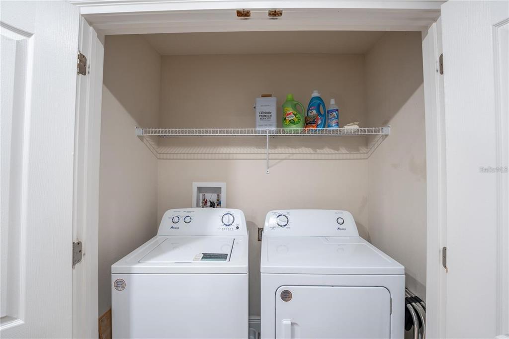 8223 Roseville Road Davenport, FL 33896 - Photo 14 of 17 a utility room with dryer and washer