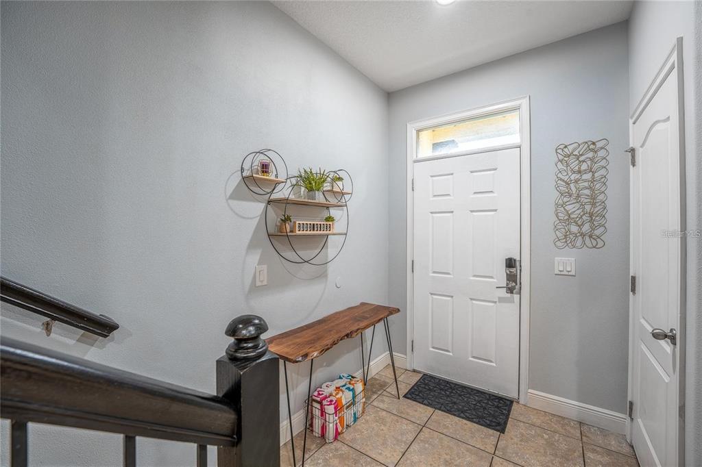 8223 Roseville Road Davenport, FL 33896 - Photo 9 of 17 a view of storage and utility room with a window