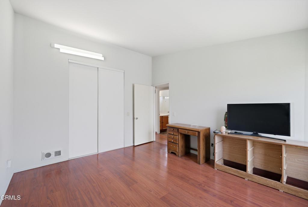 5154 Jefferson Square Oxnard, CA 93033 - Photo 23 of 23 a view of a livingroom with wooden floor