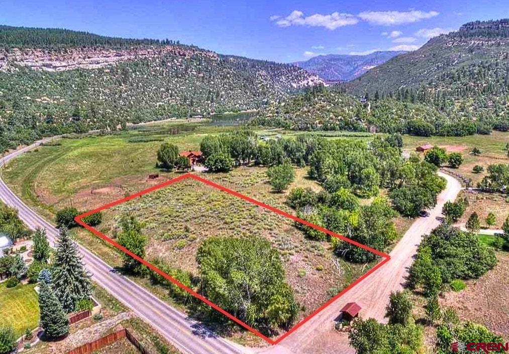 31 Turtle Lake Meadows Drive Durango, CO 81301 - Photo 2 of 27 a view of a garden with an ocean view