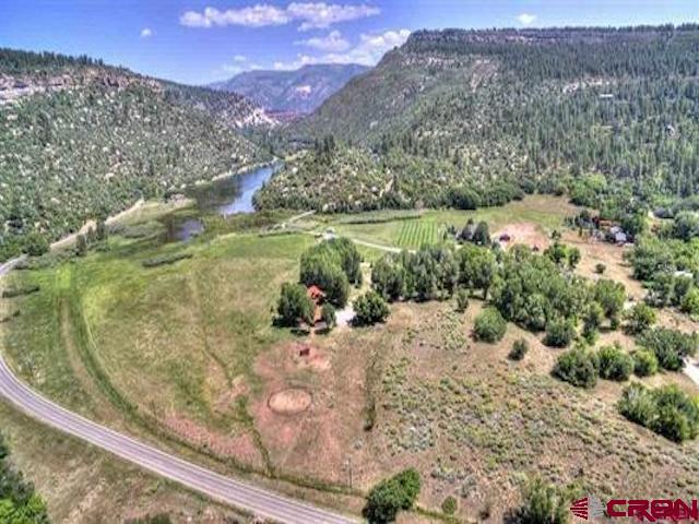 31 Turtle Lake Meadows Drive Durango, CO 81301 - Photo 5 of 27 a view of a lake with a mountain in the background