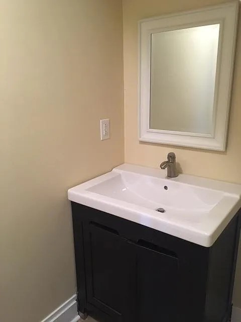 191 Old Mt Juliet Road Mount Juliet, TN 37122 - Photo 11 of 15 a bathroom with a sink vanity and a mirror