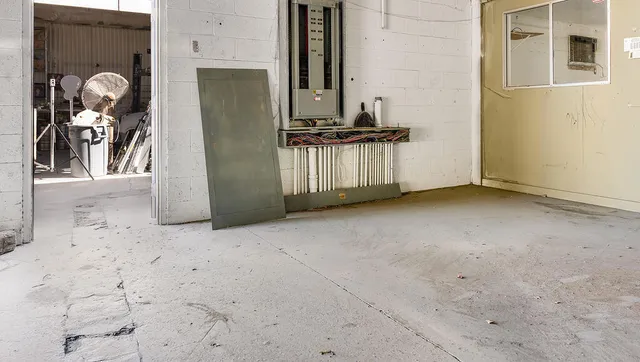a view of a room with wooden walls