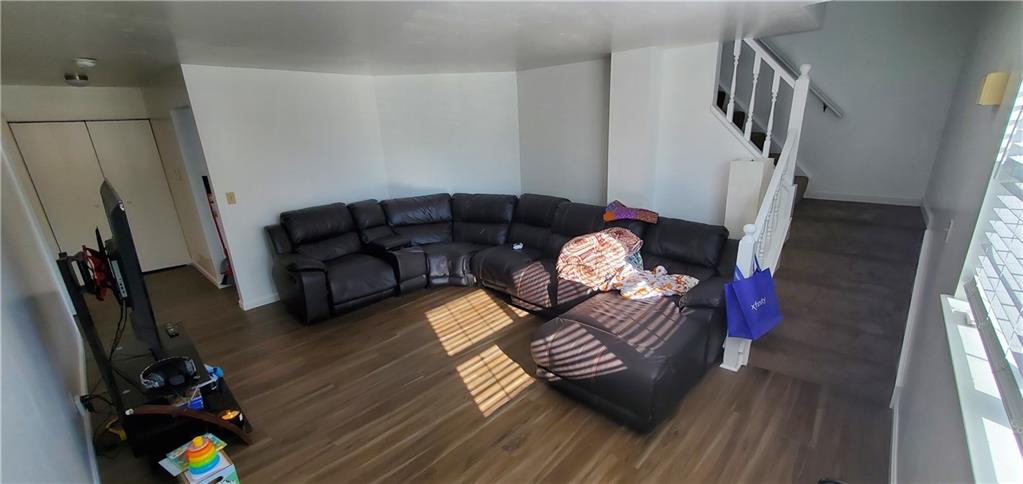 1426 Homestead Road Verona, PA 15147 - Photo 13 of 25 a living room with furniture rug and wooden floor