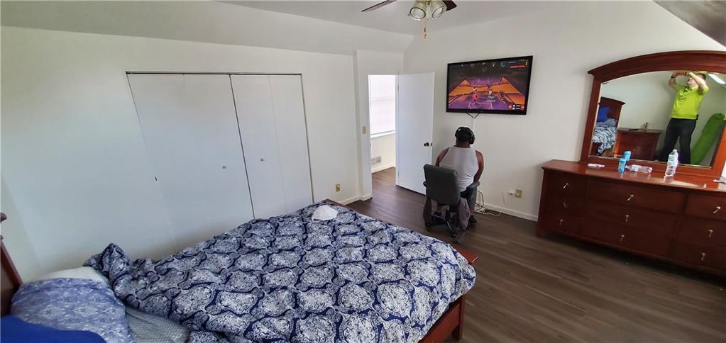 1426 Homestead Road Verona, PA 15147 - Photo 16 of 25 a bedroom with a bed and a flat screen tv