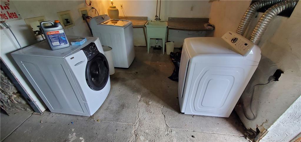 1426 Homestead Road Verona, PA 15147 - Photo 20 of 25 a utility room with dryer and washer