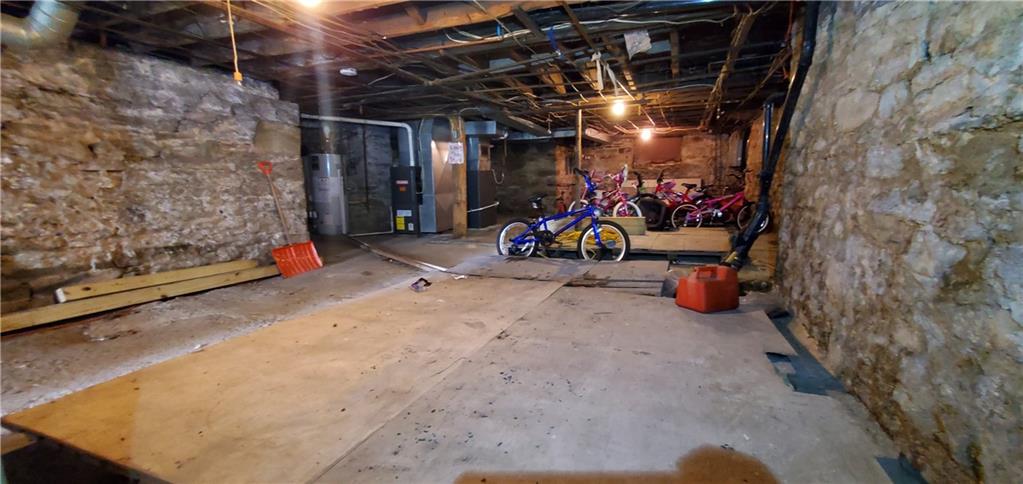 1426 Homestead Road Verona, PA 15147 - Photo 22 of 25 a view of a garage with a lot of stuff