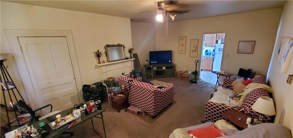 1426 Homestead Road Verona, PA 15147 - Photo 7 of 25 a living room with furniture and a flat screen tv