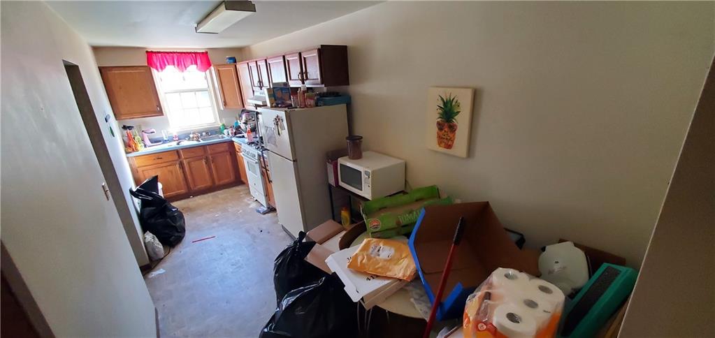 1426 Homestead Road Verona, PA 15147 - Photo 8 of 25 a room with furniture and wooden floor