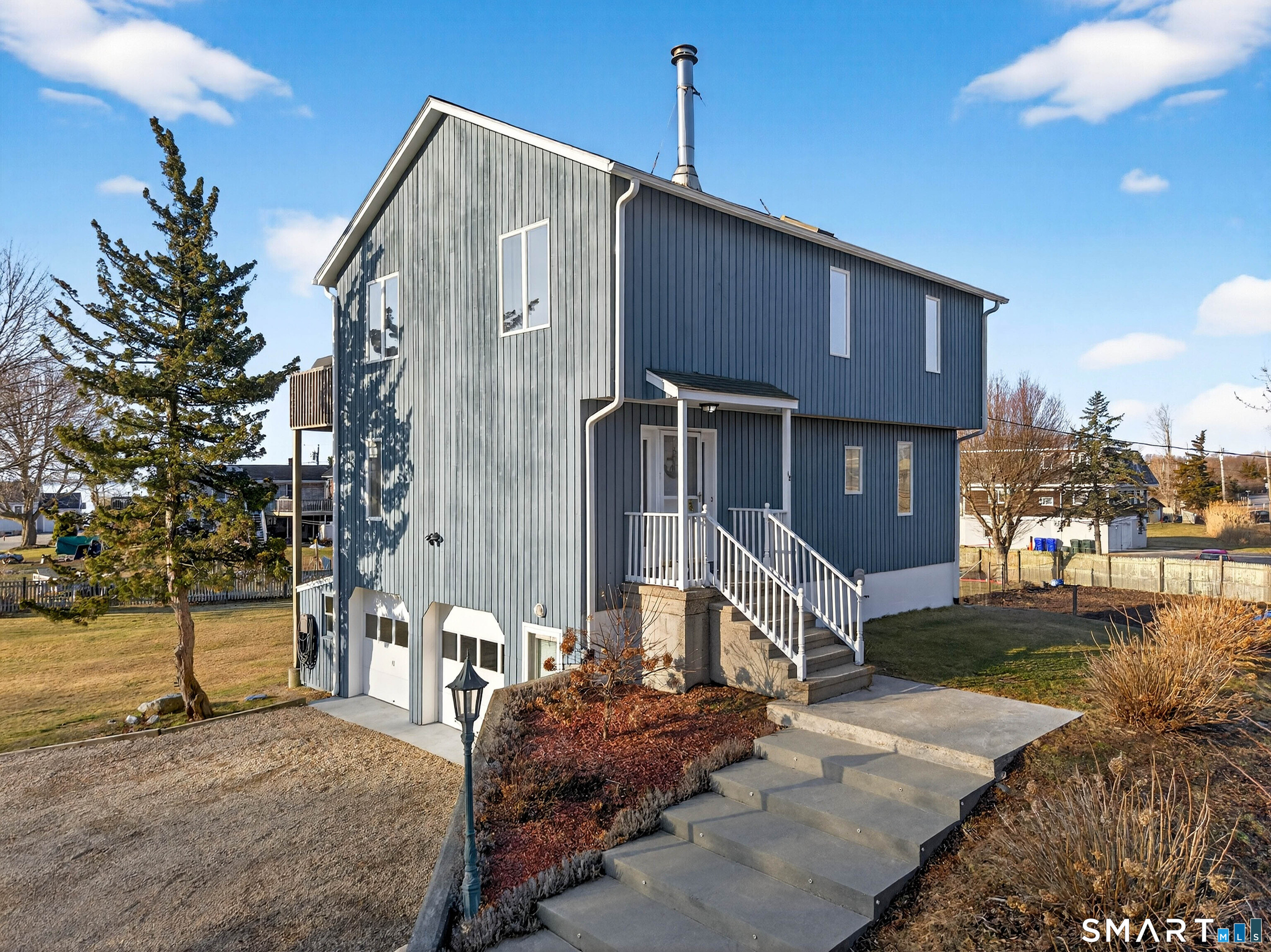 18 Noble Avenue Groton, CT 06340 - Photo 4 of 40 a front view of a house with garden