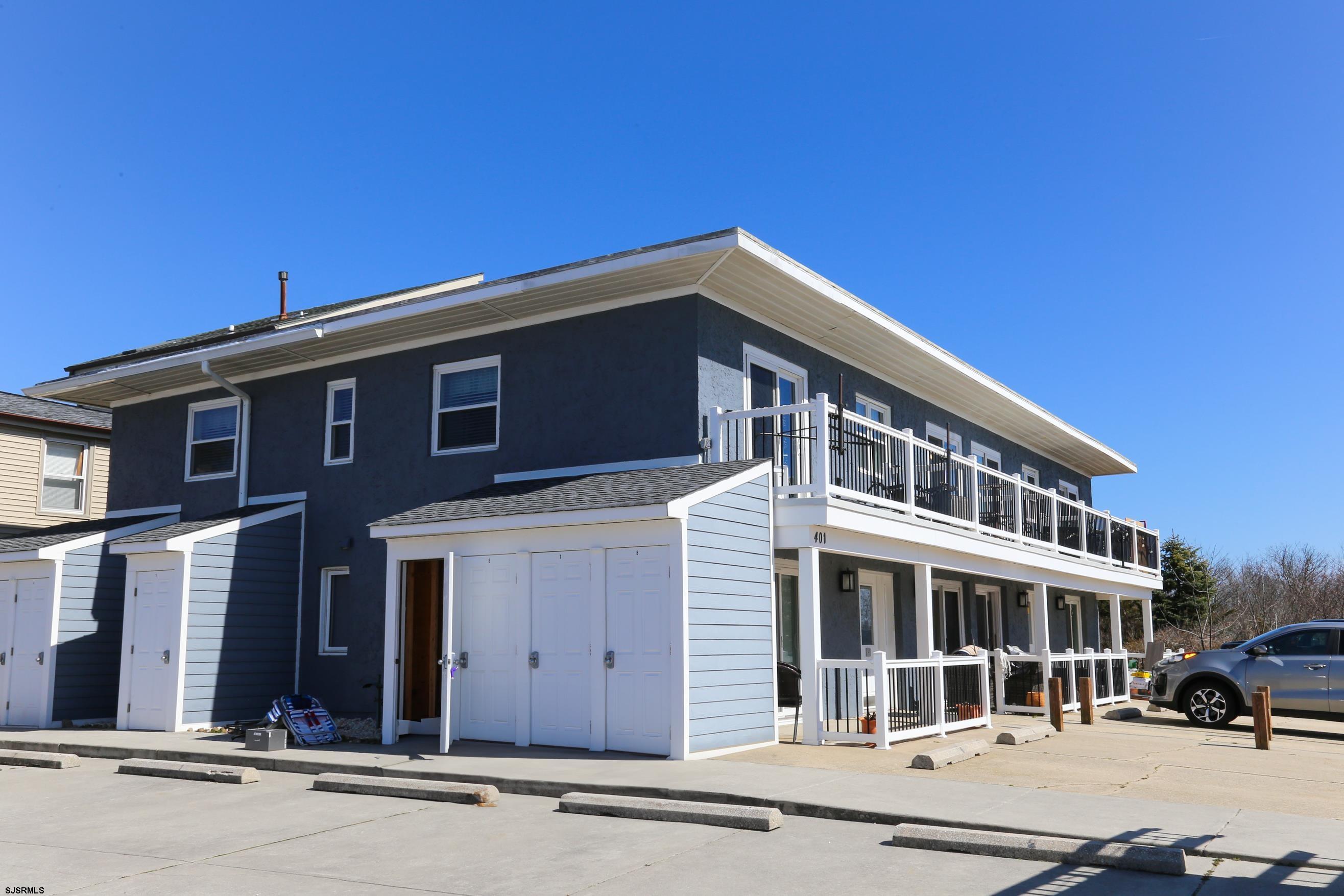 401 37th Street South, Unit 5 Brigantine, NJ 08203 - Photo 34 of 48 a front view of a building with street view