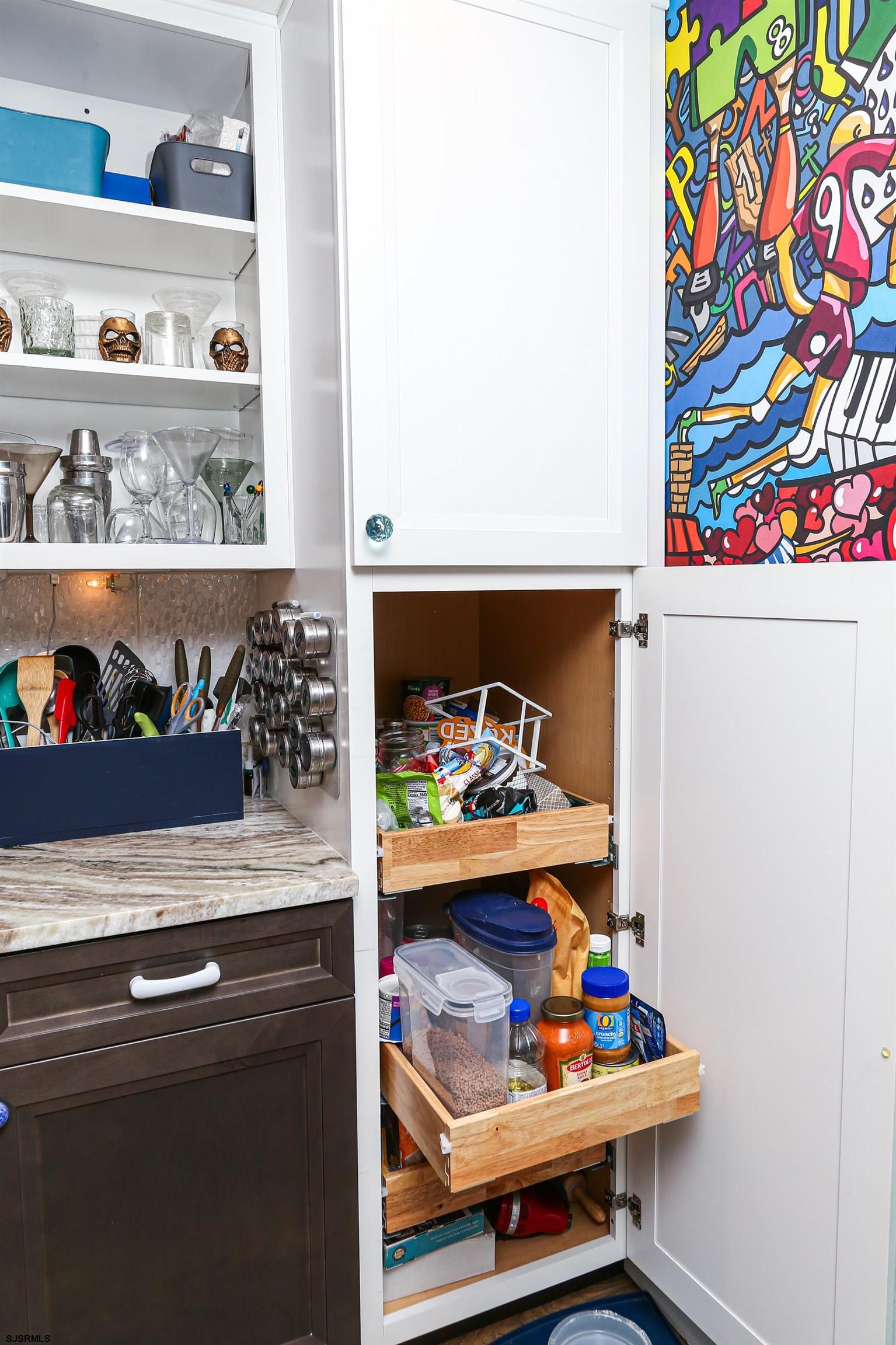 401 37th Street South, Unit 5 Brigantine, NJ 08203 - Photo 8 of 48 a room with lots of different kinds of food
