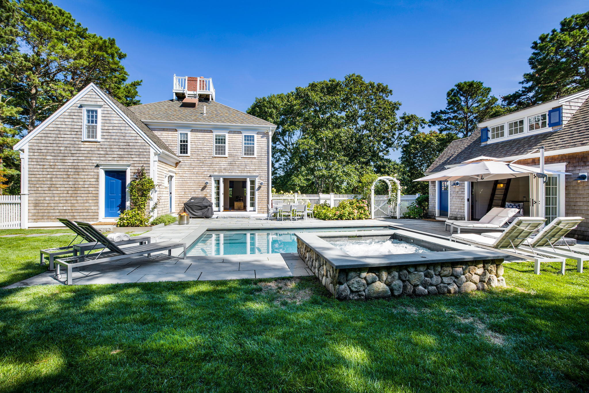 141 Point Hill Road West Barnstable, MA 02668 - Photo 14 of 26 a view of a house with pool and chairs