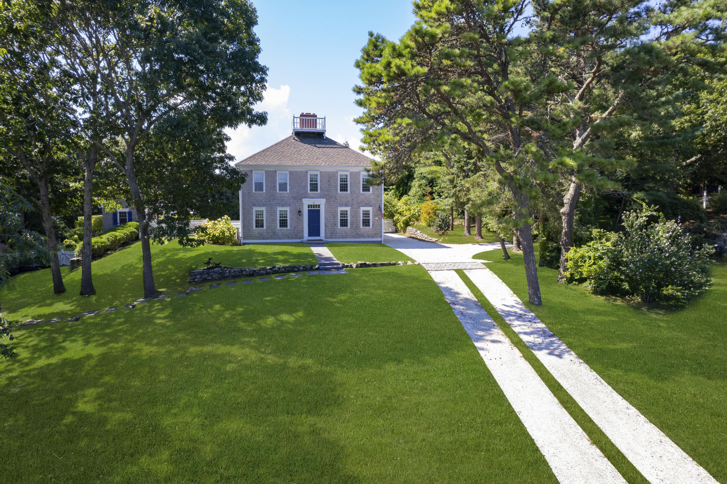 141 Point Hill Road West Barnstable, MA 02668 - Photo 19 of 26 a front view of a house with a yard