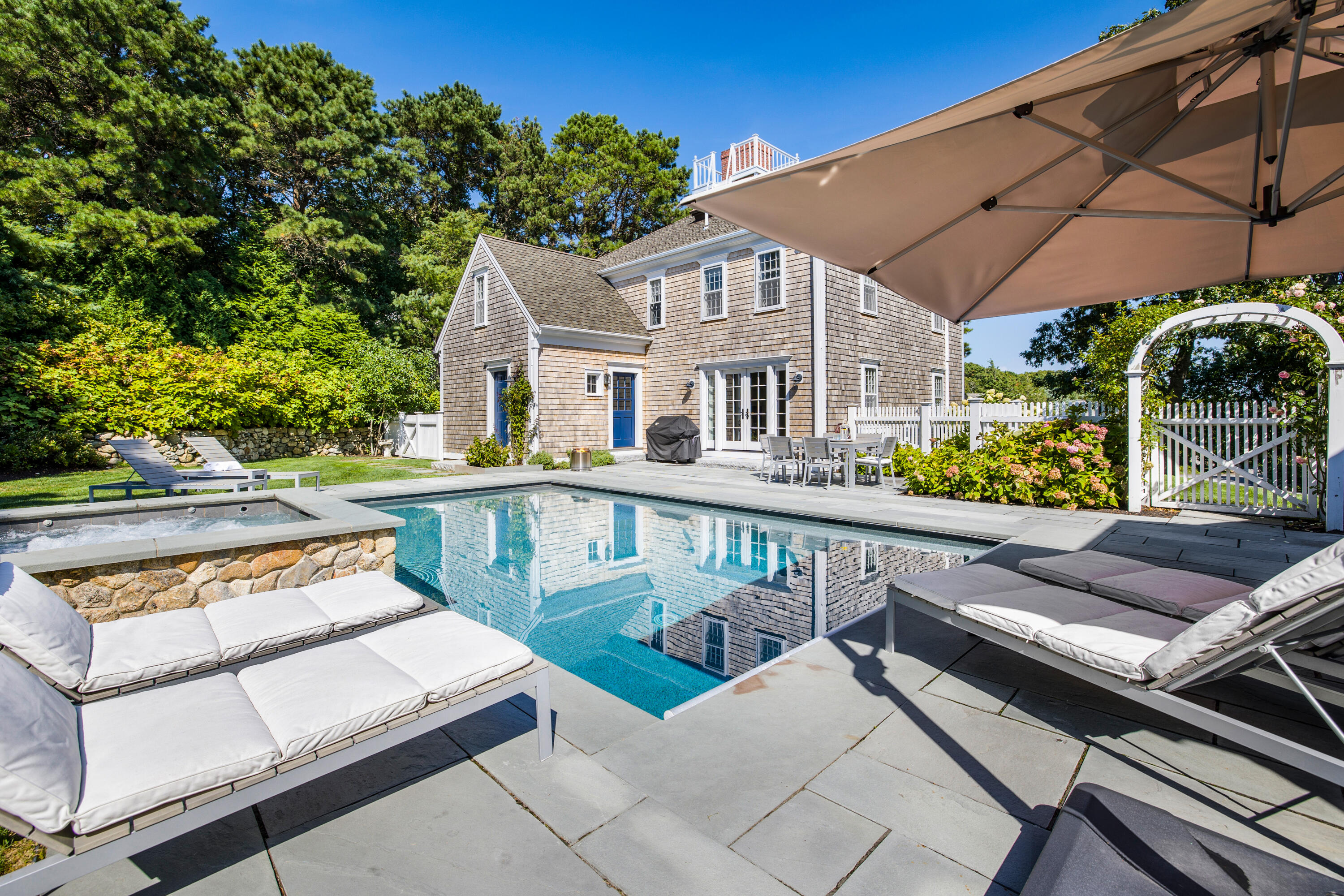 141 Point Hill Road West Barnstable, MA 02668 - Photo 22 of 26 a balcony with two chairs and a table