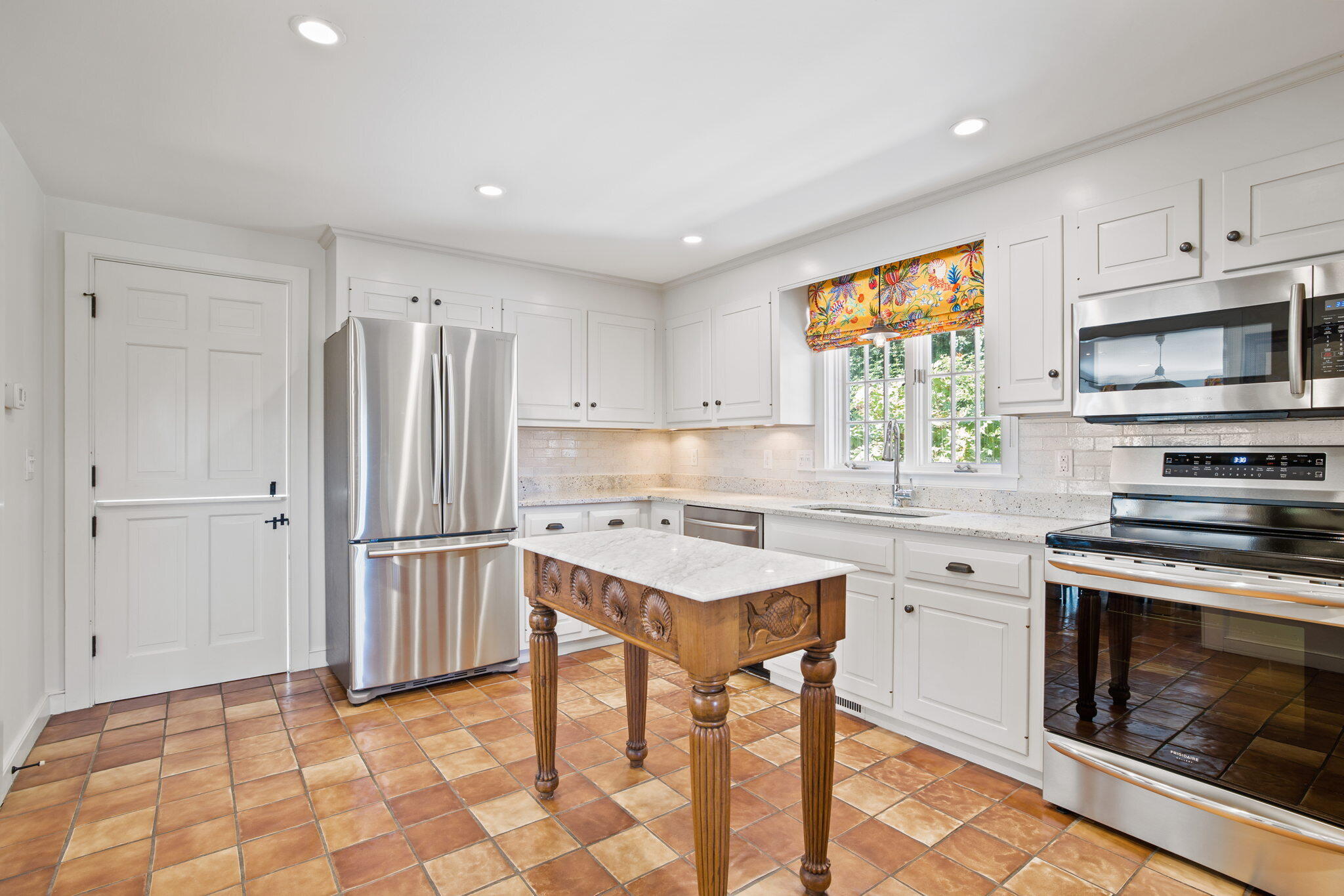 141 Point Hill Road West Barnstable, MA 02668 - Photo 6 of 26 a kitchen with appliances cabinets and a sink