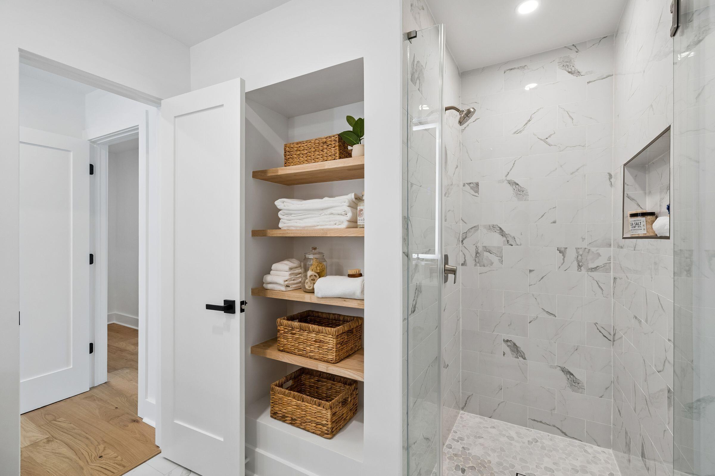 512 Risher Street Charleston, SC 29407 - Photo 37 of 55 Primary Bathroom Shower and Shelving