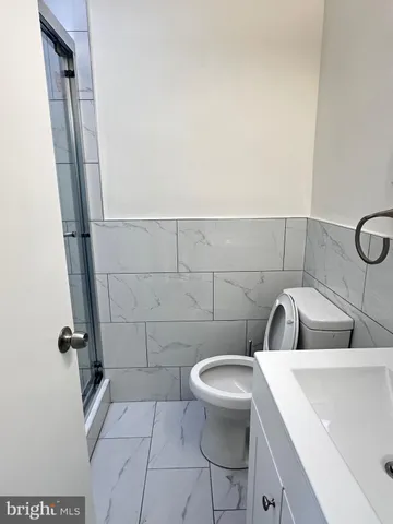 a bathroom with a sink and toilet
