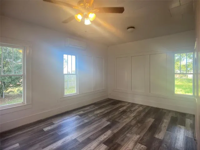 a bathroom with a sink a toilet and vanity