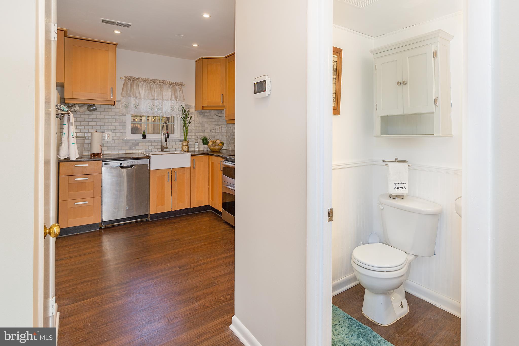 2228 Gunsmith Square Reston, VA 20191 - Photo 8 of 33 Side Kitchen View with a nearby powder room