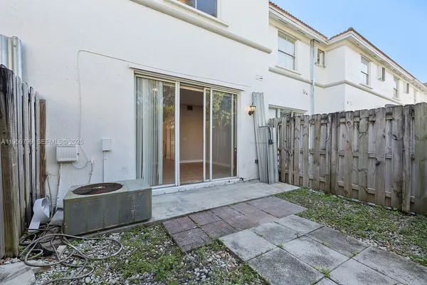 a view of a back yard of the house