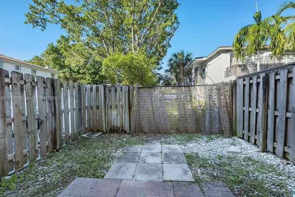 a view of a wooden fence