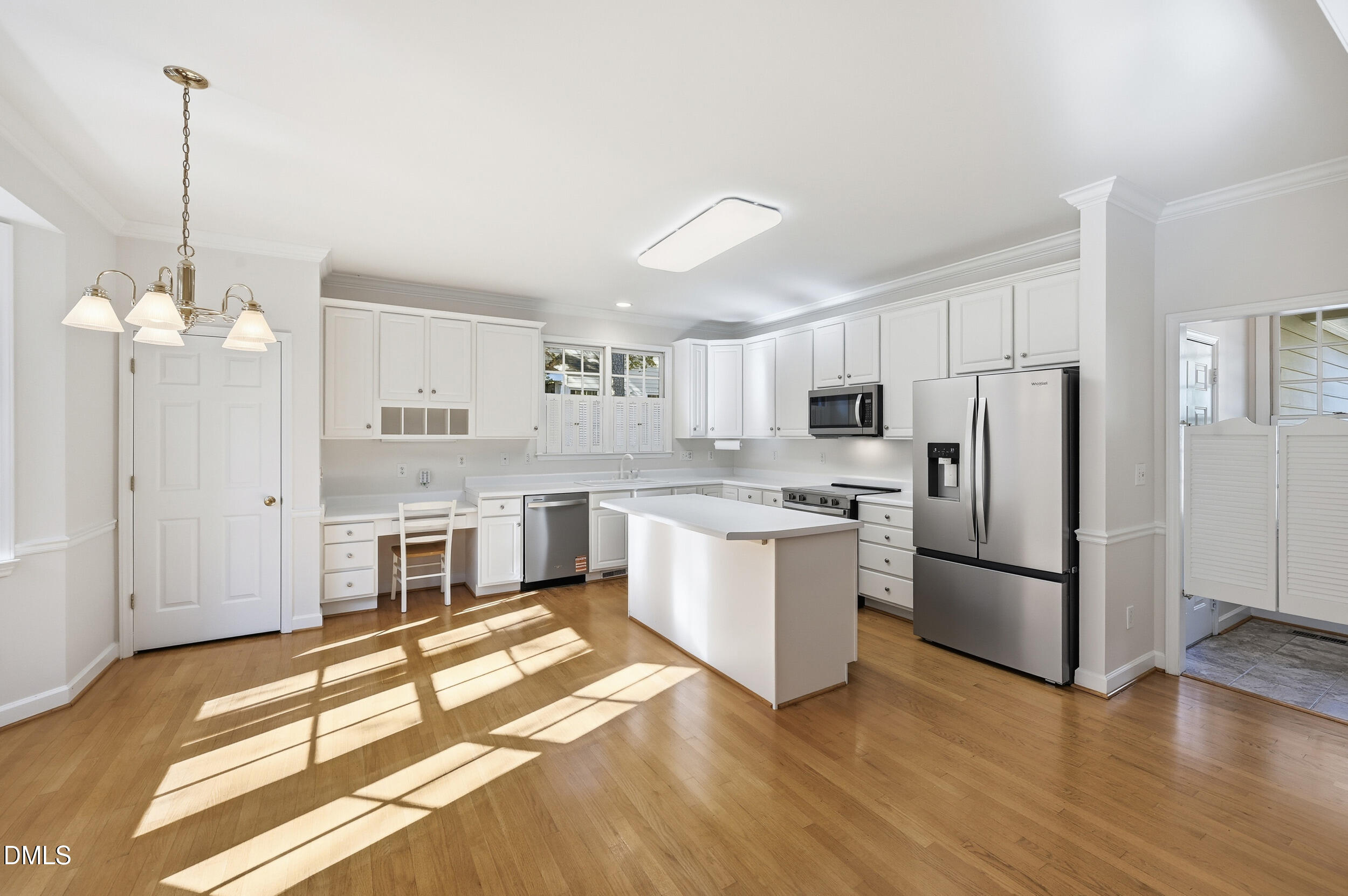 4 Wembley Court Durham, NC 27705 - Photo 13 of 41 a kitchen with a refrigerator sink and cabinets