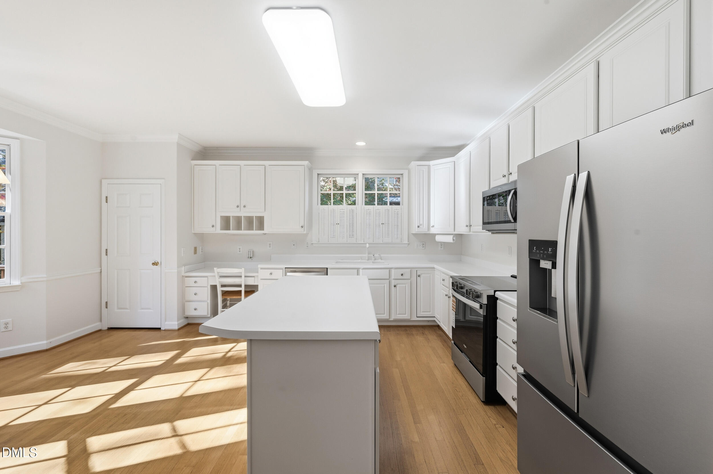 4 Wembley Court Durham, NC 27705 - Photo 15 of 41 a kitchen with a refrigerator a sink and a stove