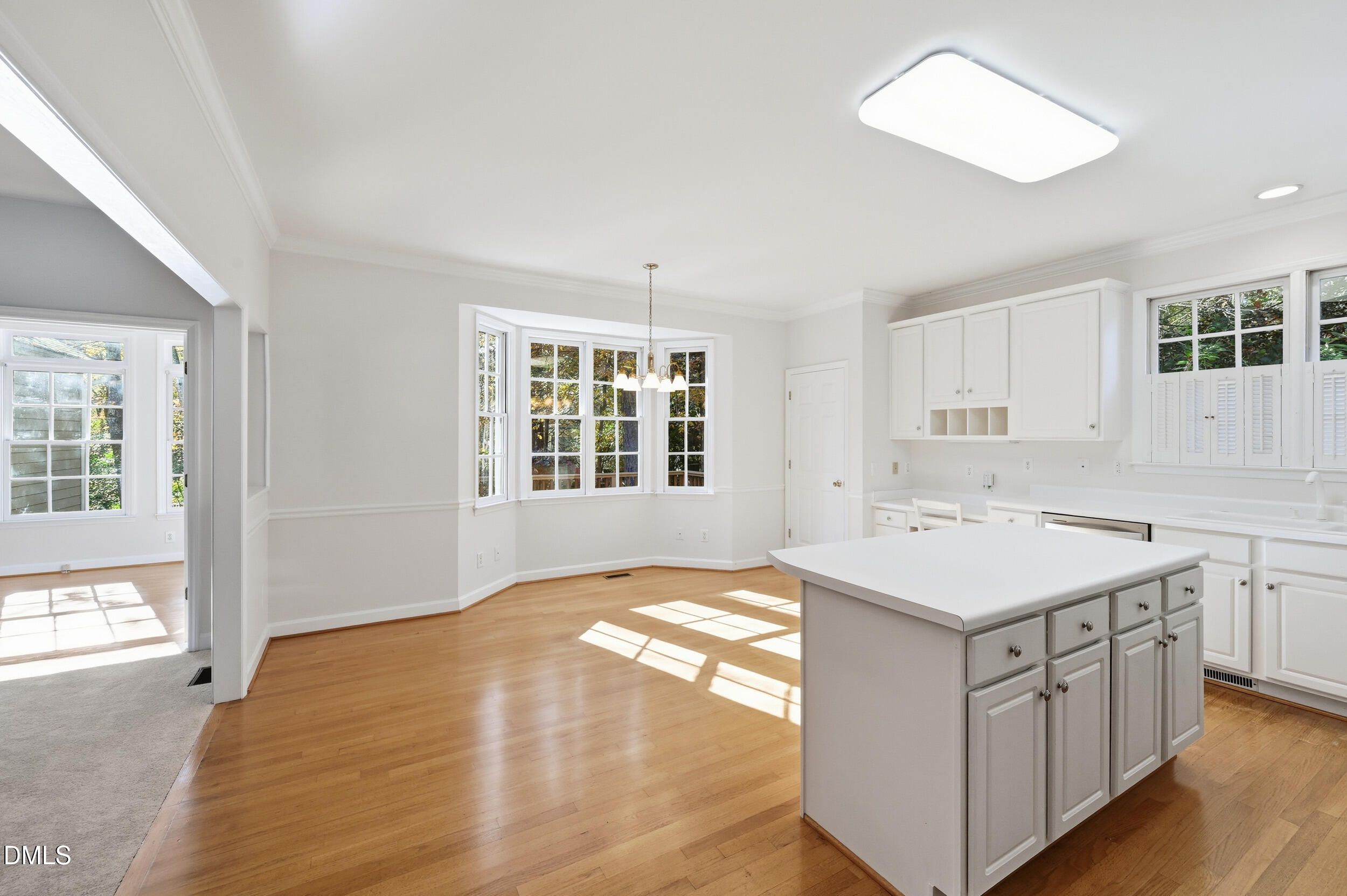 4 Wembley Court Durham, NC 27705 - Photo 16 of 41 a kitchen with a sink stove and cabinets