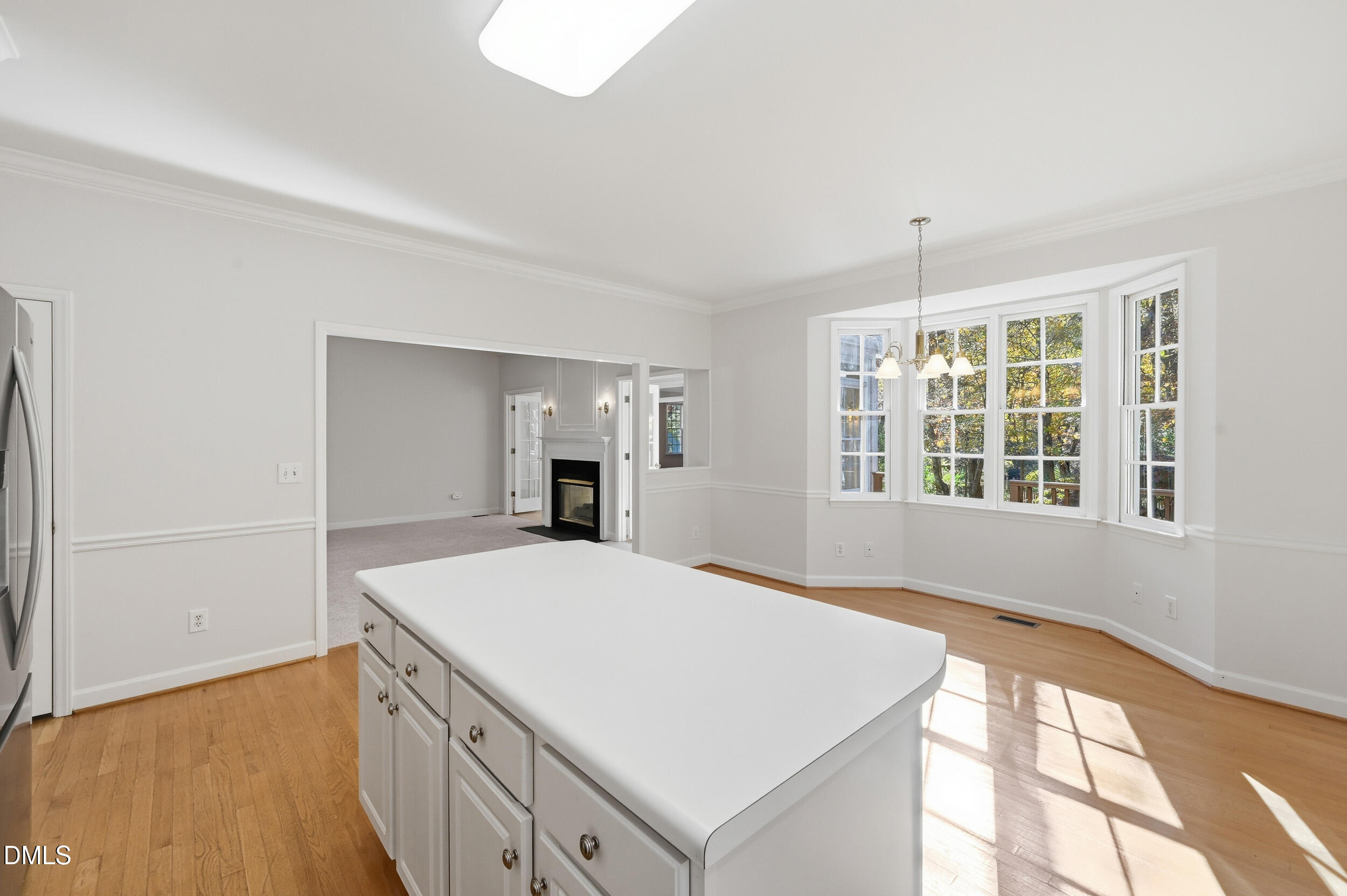 4 Wembley Court Durham, NC 27705 - Photo 17 of 41 a view of an empty room with window and wooden floor