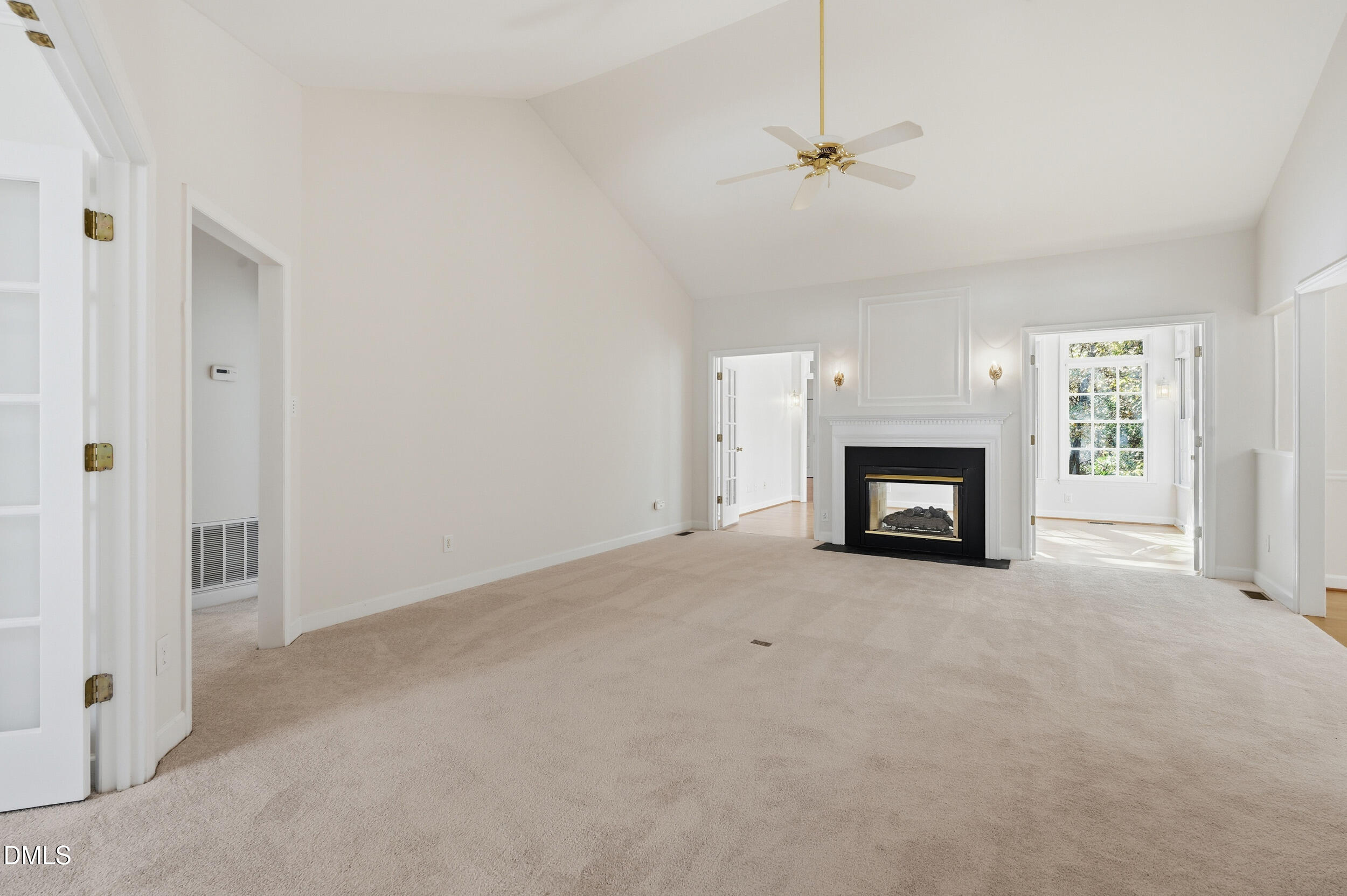 4 Wembley Court Durham, NC 27705 - Photo 18 of 41 an empty room with windows and fireplace