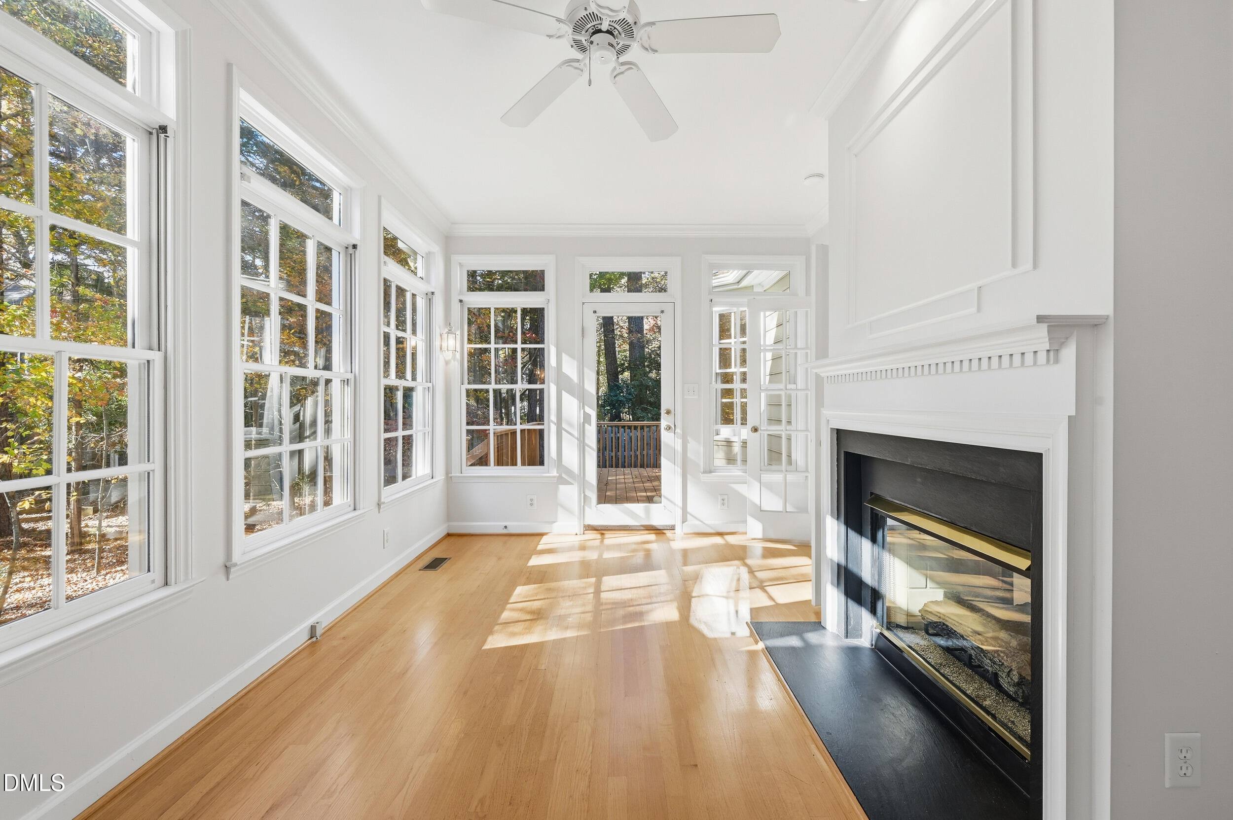 4 Wembley Court Durham, NC 27705 - Photo 22 of 41 a view of an empty room with a fireplace and a window