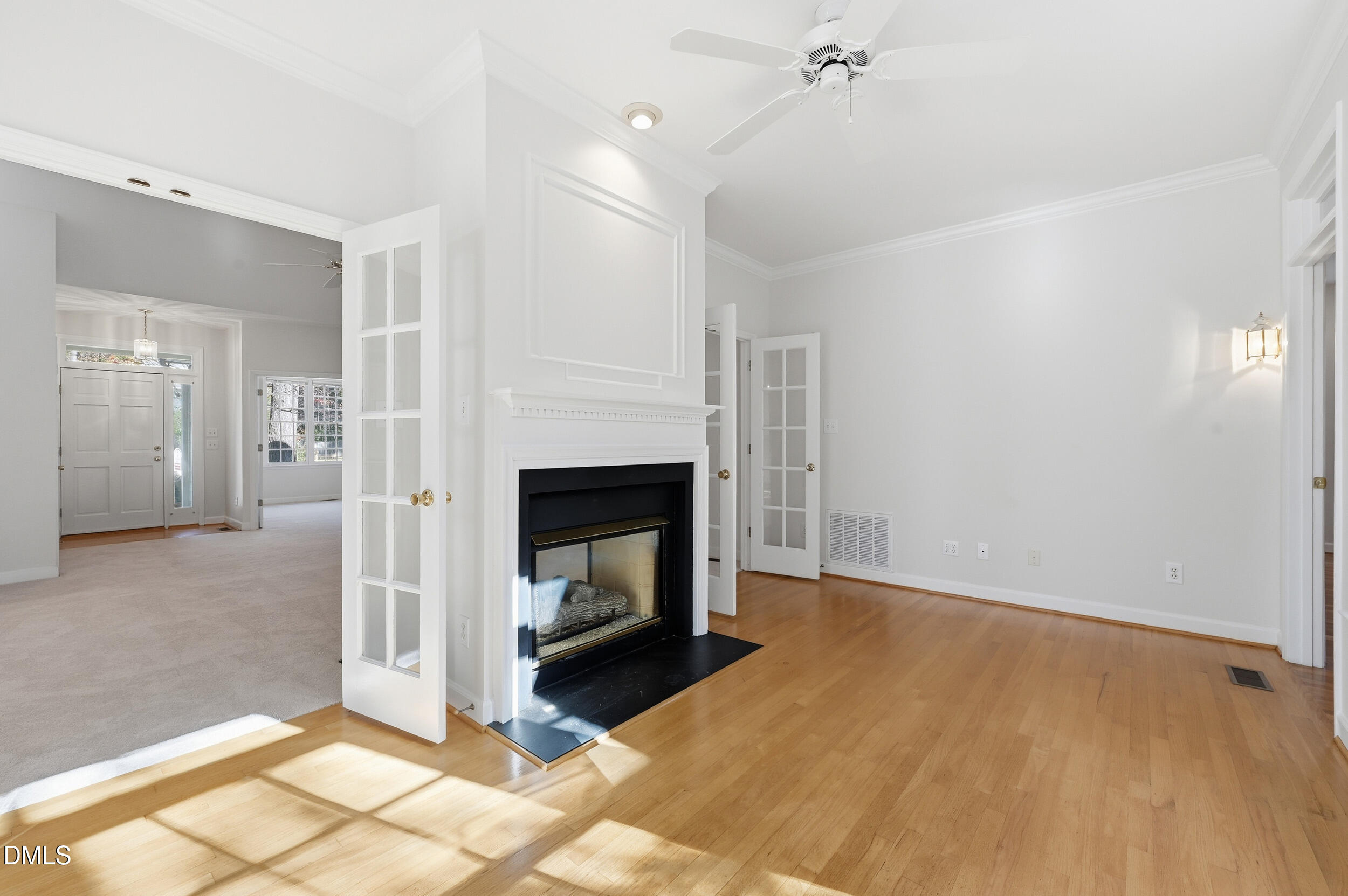 4 Wembley Court Durham, NC 27705 - Photo 23 of 41 a view of a livingroom with a fireplace and window