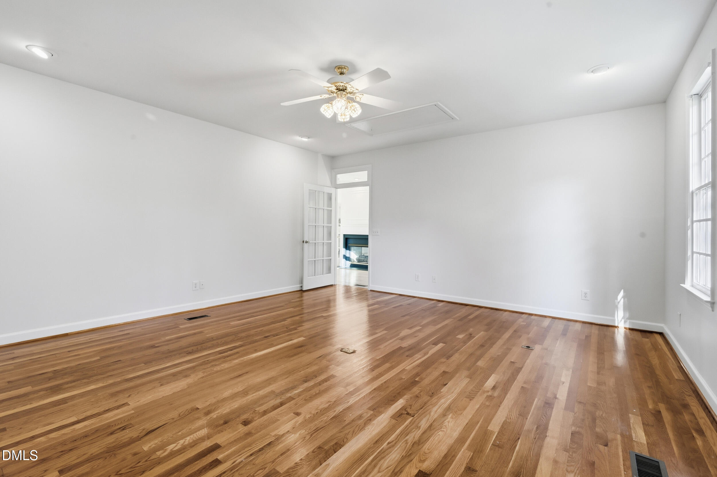 4 Wembley Court Durham, NC 27705 - Photo 26 of 41 wooden floor in an empty room with a window